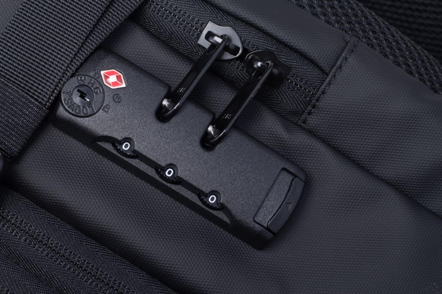 Close-up of LitePack Pro's built-in vacuum system and secure lock mechanism for optimized space-saving travel.